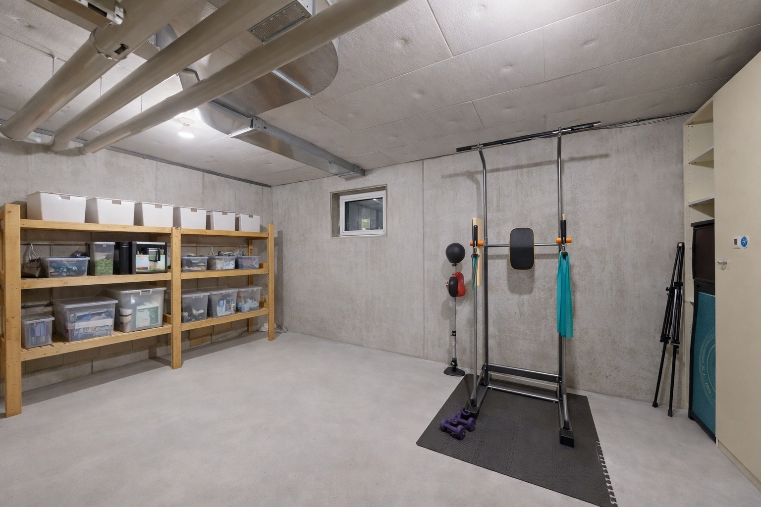 exercise room with concrete flooring
