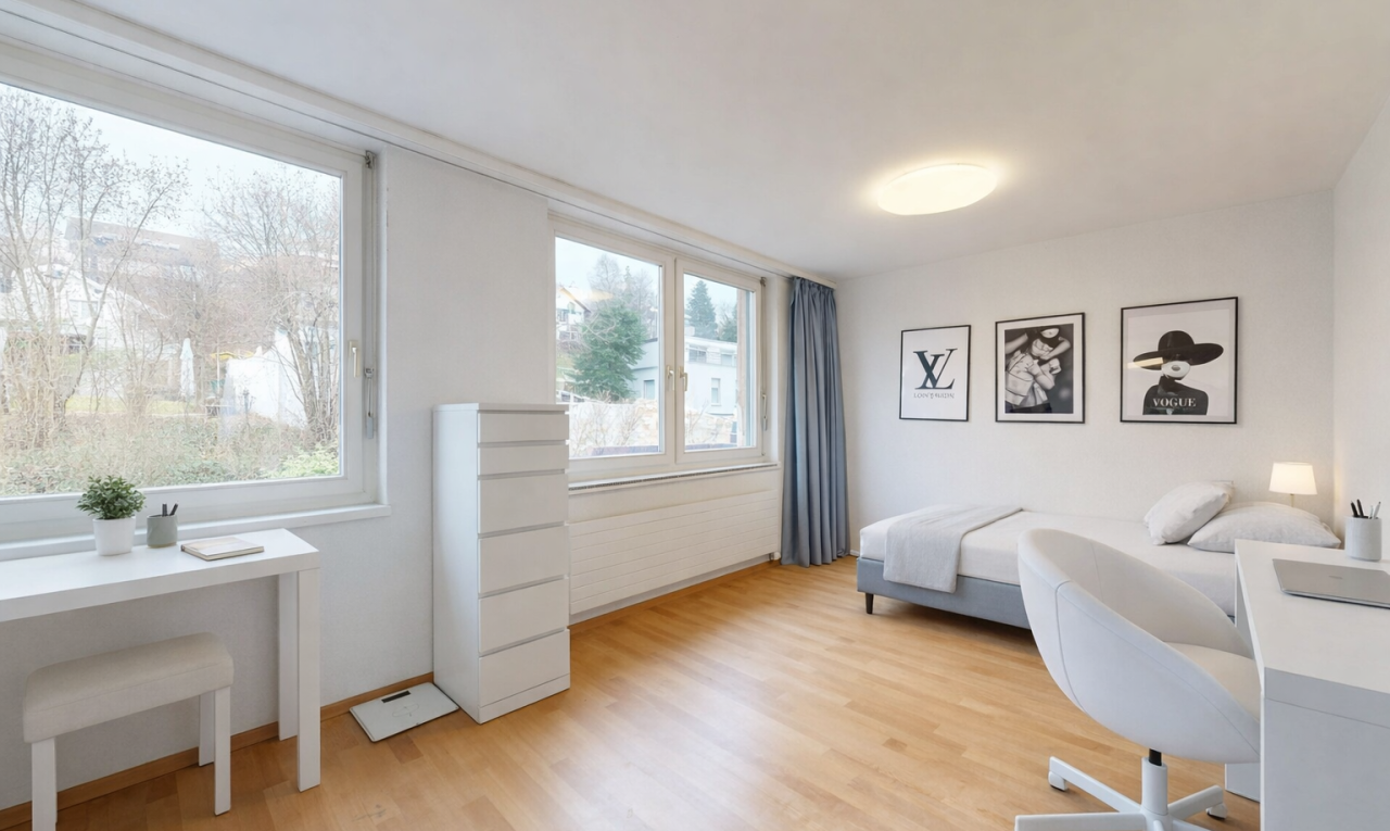 room with an office area and light wood-style floors