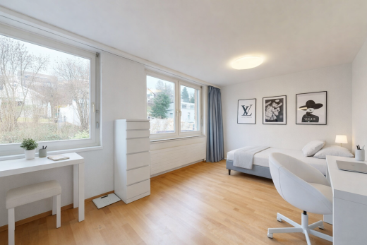 chambre avec espace bureau, inside property, cloison sèche, drywall, et sol en finition bois