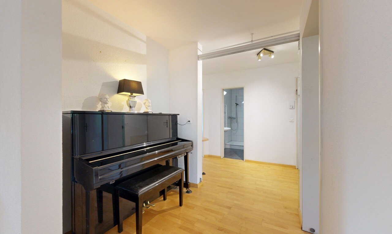halle / korridor mit holzfußboden, wood finish floor, inside property, gipskartonwand, und drywall