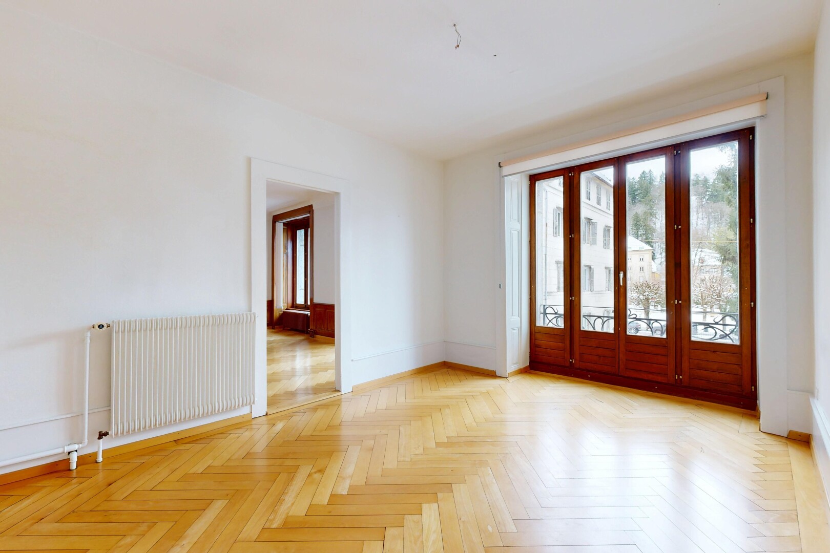 empty room featuring radiator heating unit