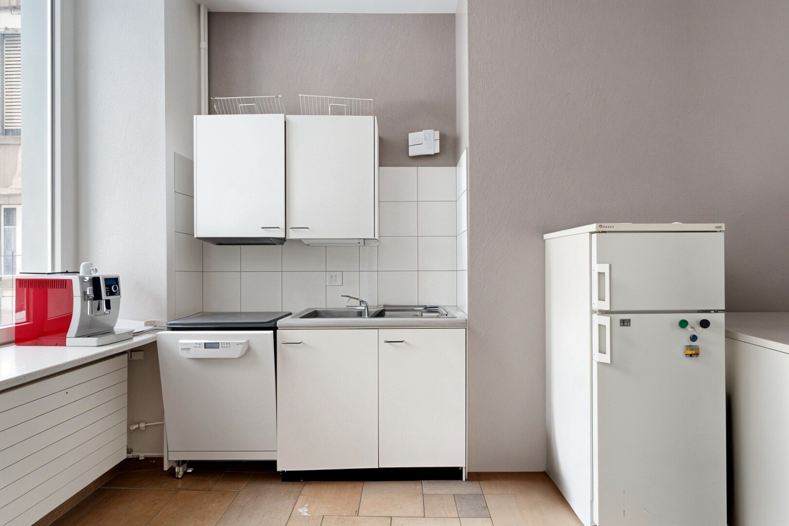 kitchen featuring light countertops, white appliances, white cabinetry, and tasteful backsplash