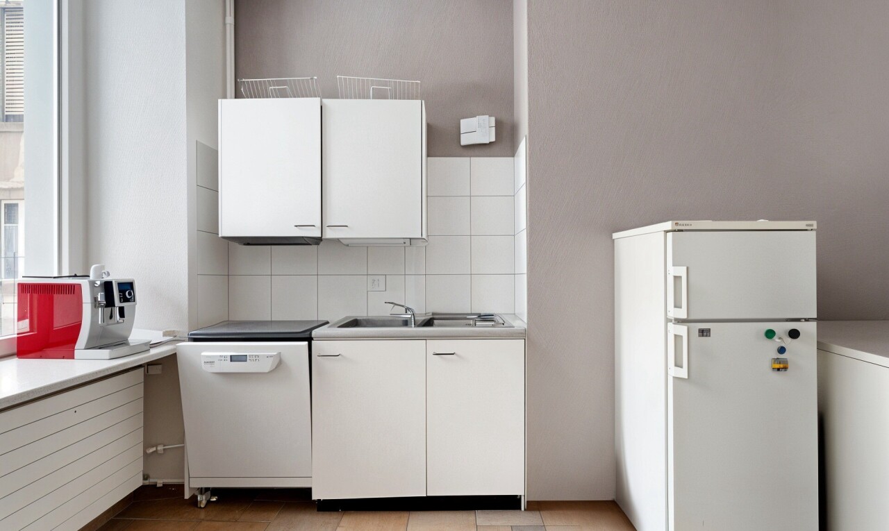 kitchen featuring light countertops, white appliances, white cabinetry, and tasteful backsplash