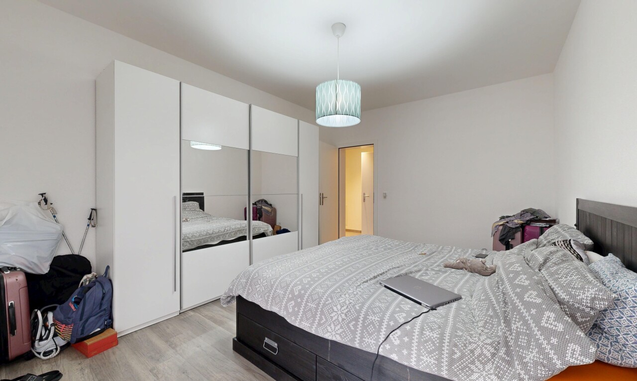 room featuring light wood-style flooring and a closet
