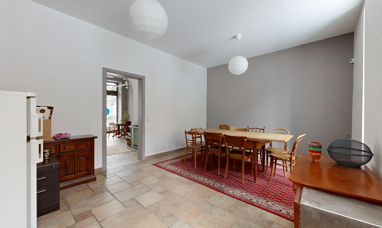 dining room with stone tile flooring