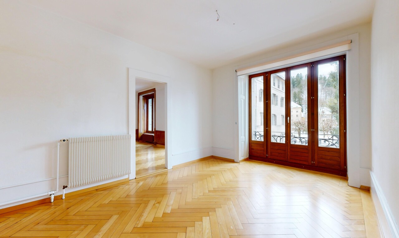 empty room featuring radiator heating unit