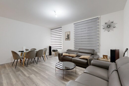 living / dining area with wood finished floors