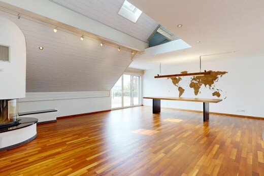 empty room featuring lofted ceiling with beams, a skylight, wood finished floors, and wood ceiling