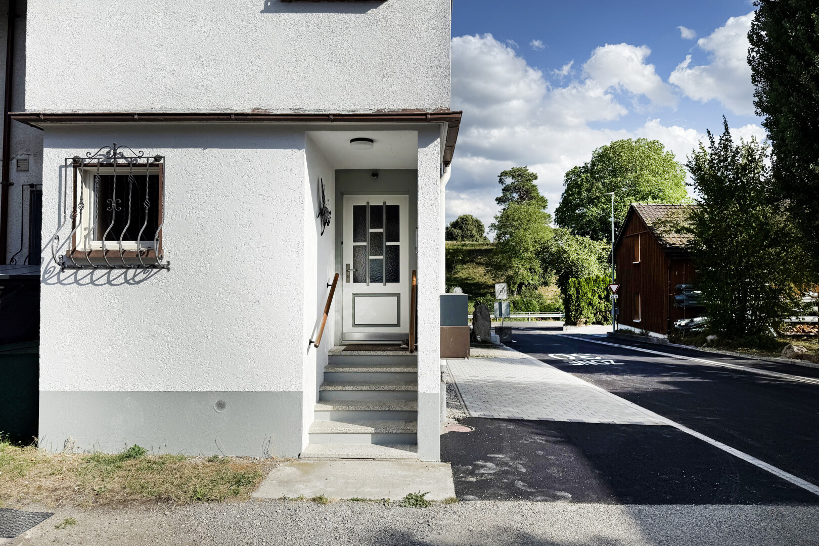 view of home with stucco siding