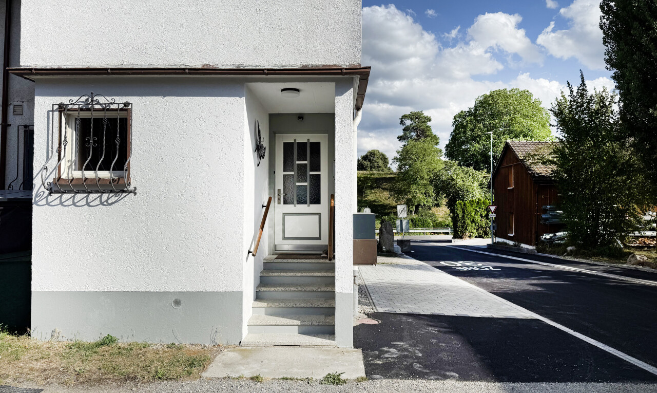 view of home with stucco siding