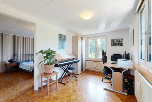 office featuring parquet floors and radiator