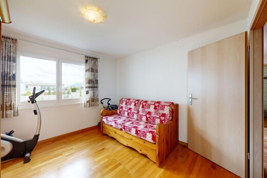 room / bedroom with light wood finished floors and baseboards