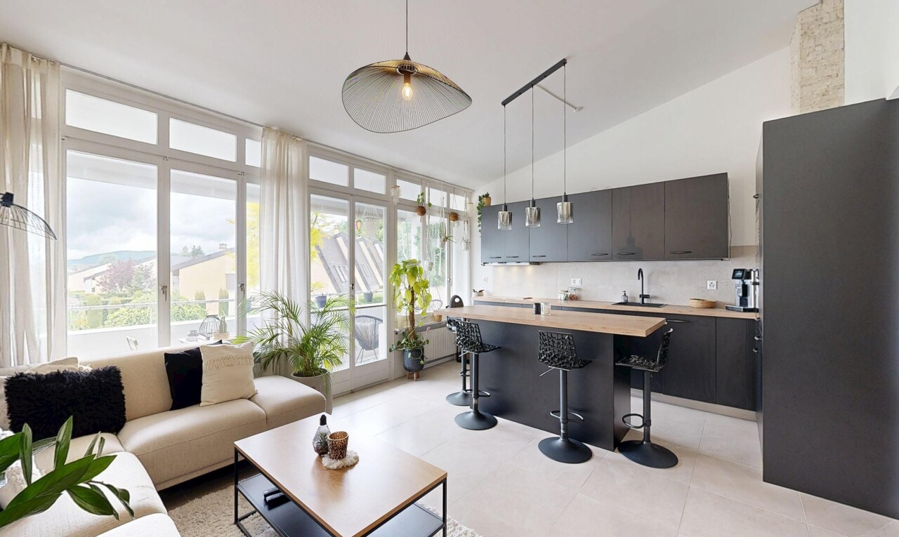 living area featuring lofted ceiling