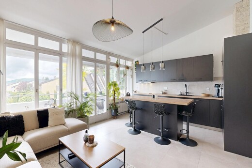 living area featuring lofted ceiling