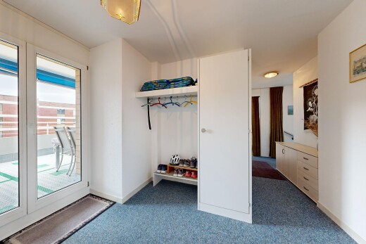 zimmer / schlafzimmer mit drywall, gipskartonwand, carpet, teppich, und inside property