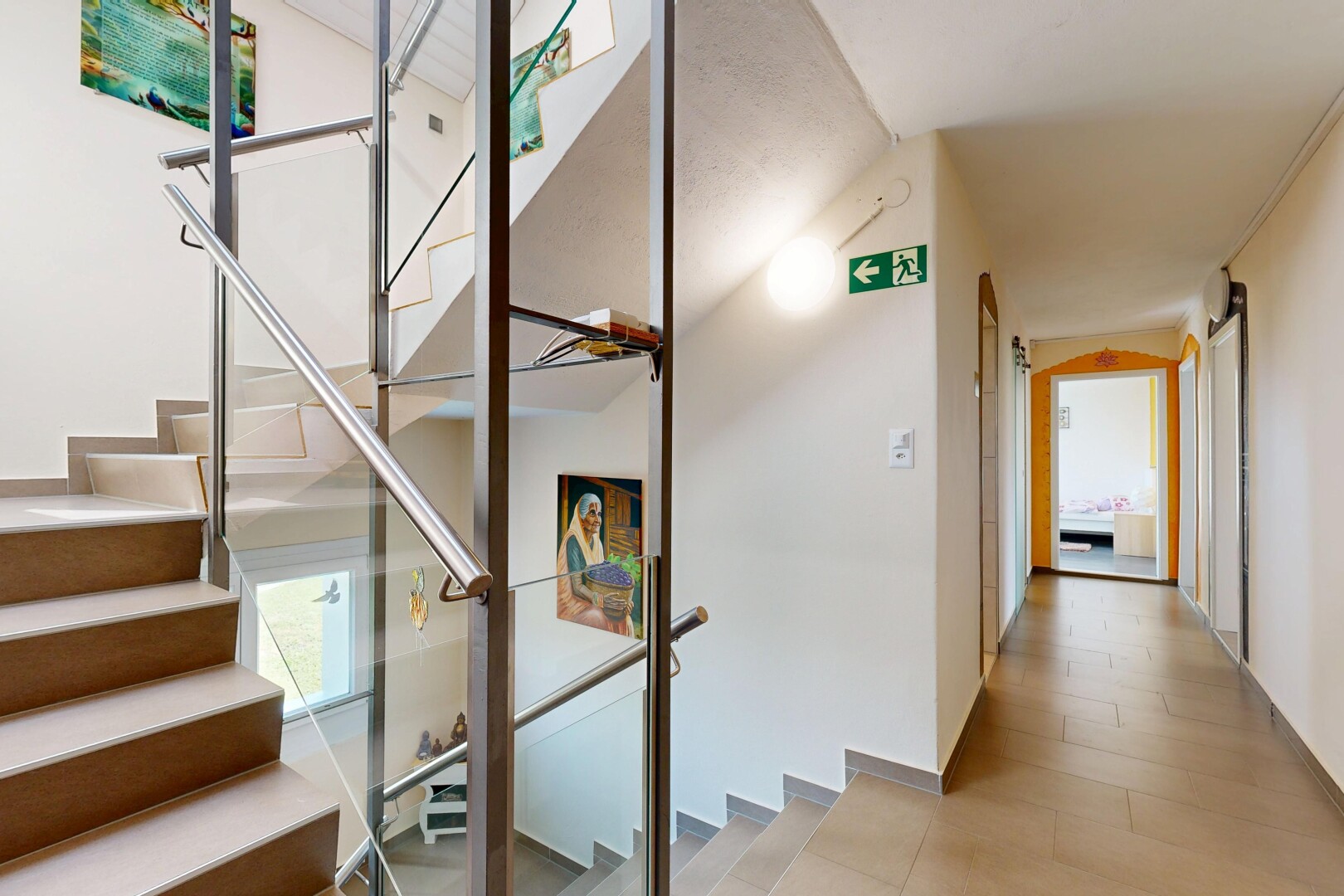 stairway featuring baseboards