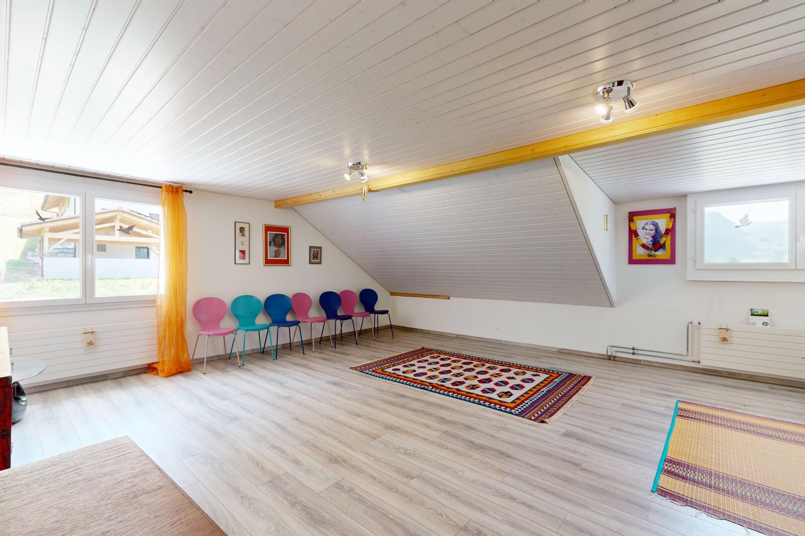 empty room featuring vaulted ceiling and light wood-style floors