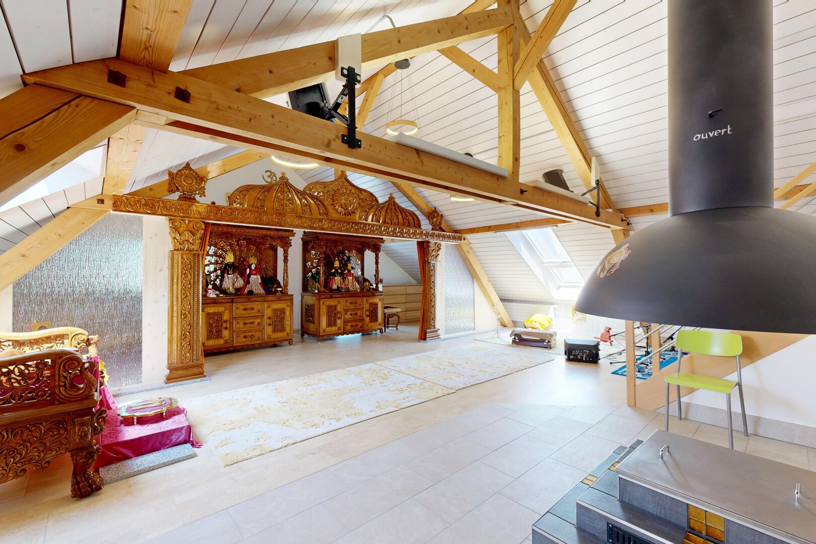 living area featuring beamed ceiling