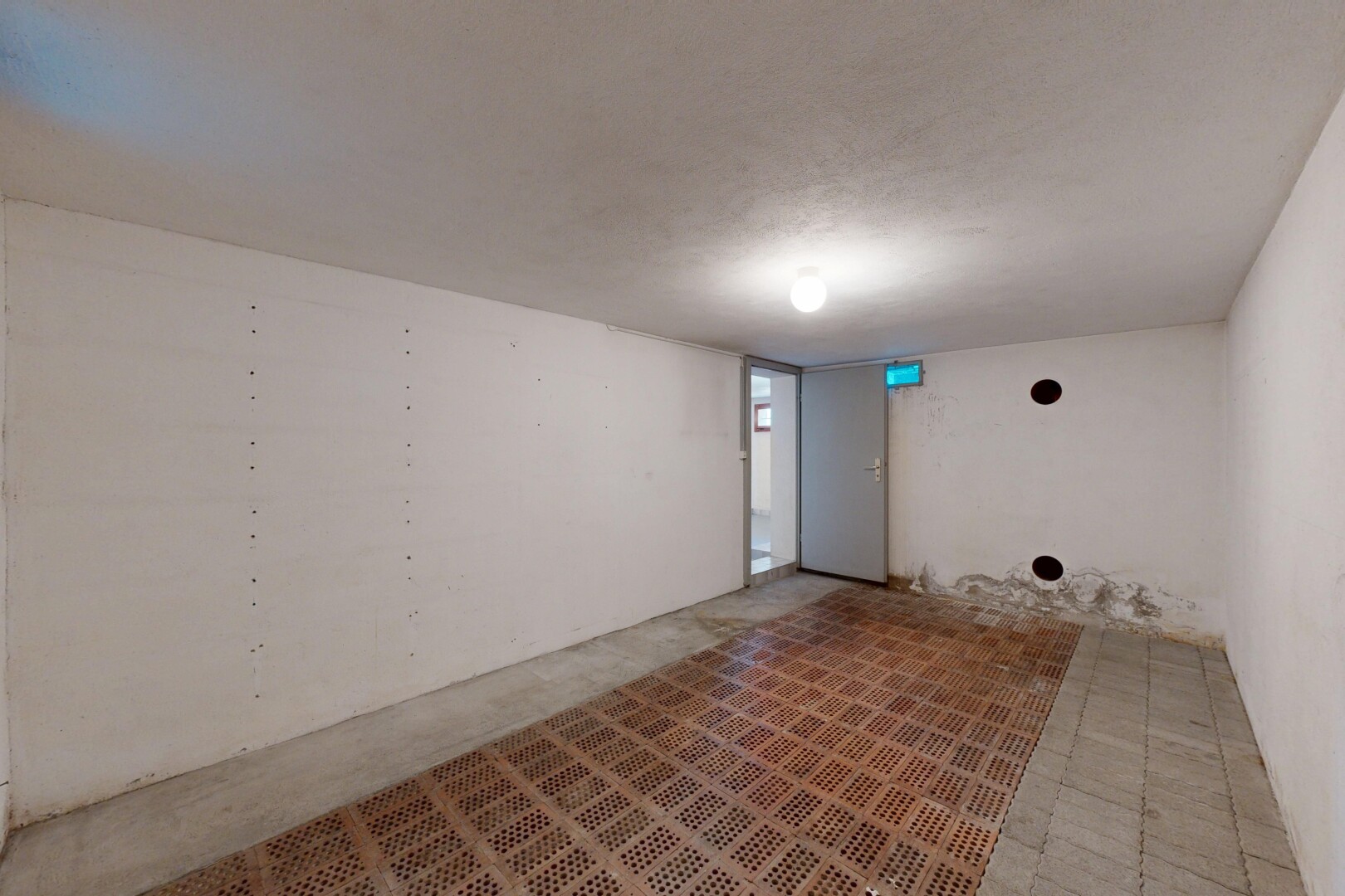 unfurnished room featuring unfinished concrete flooring