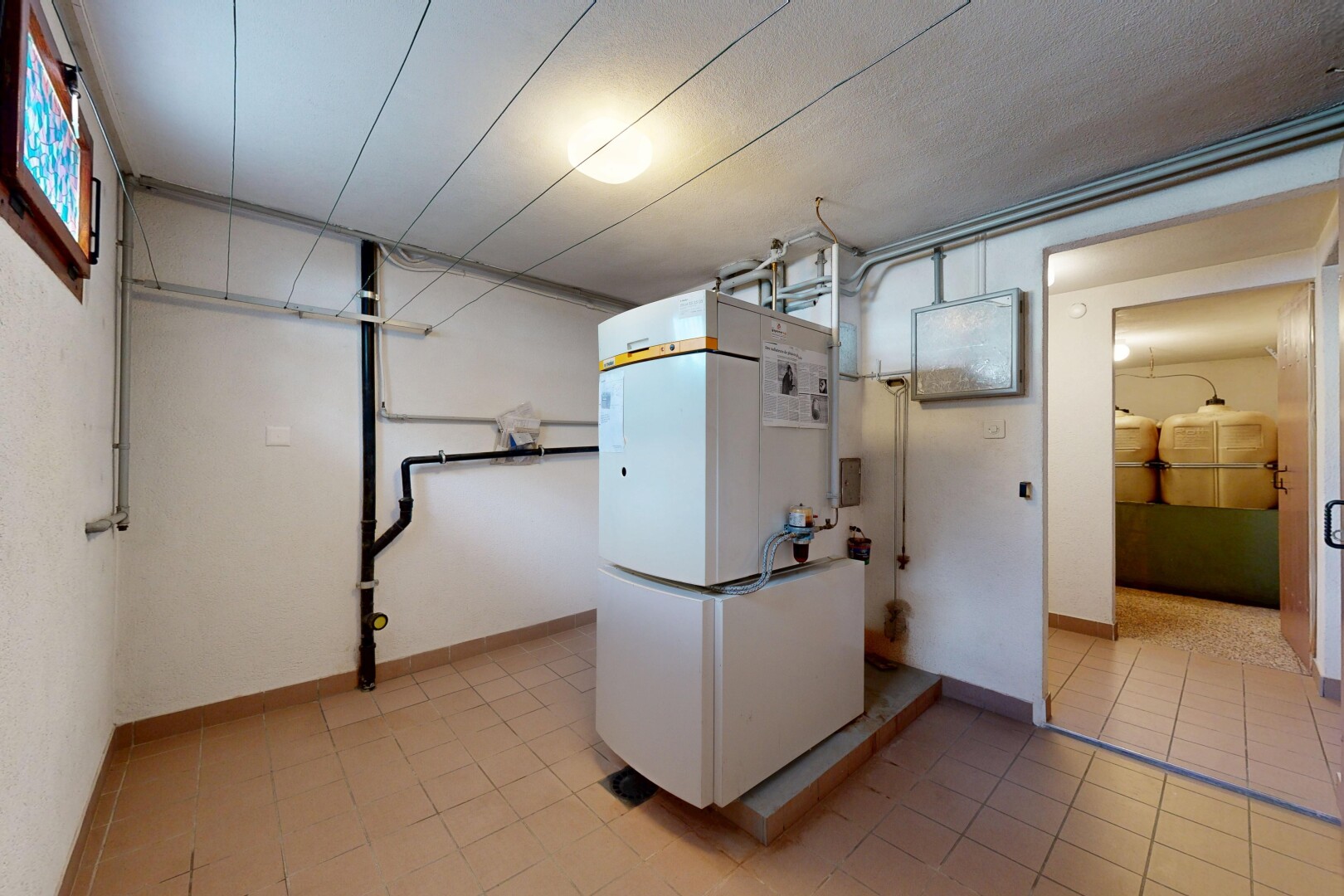 laundry room featuring baseboards