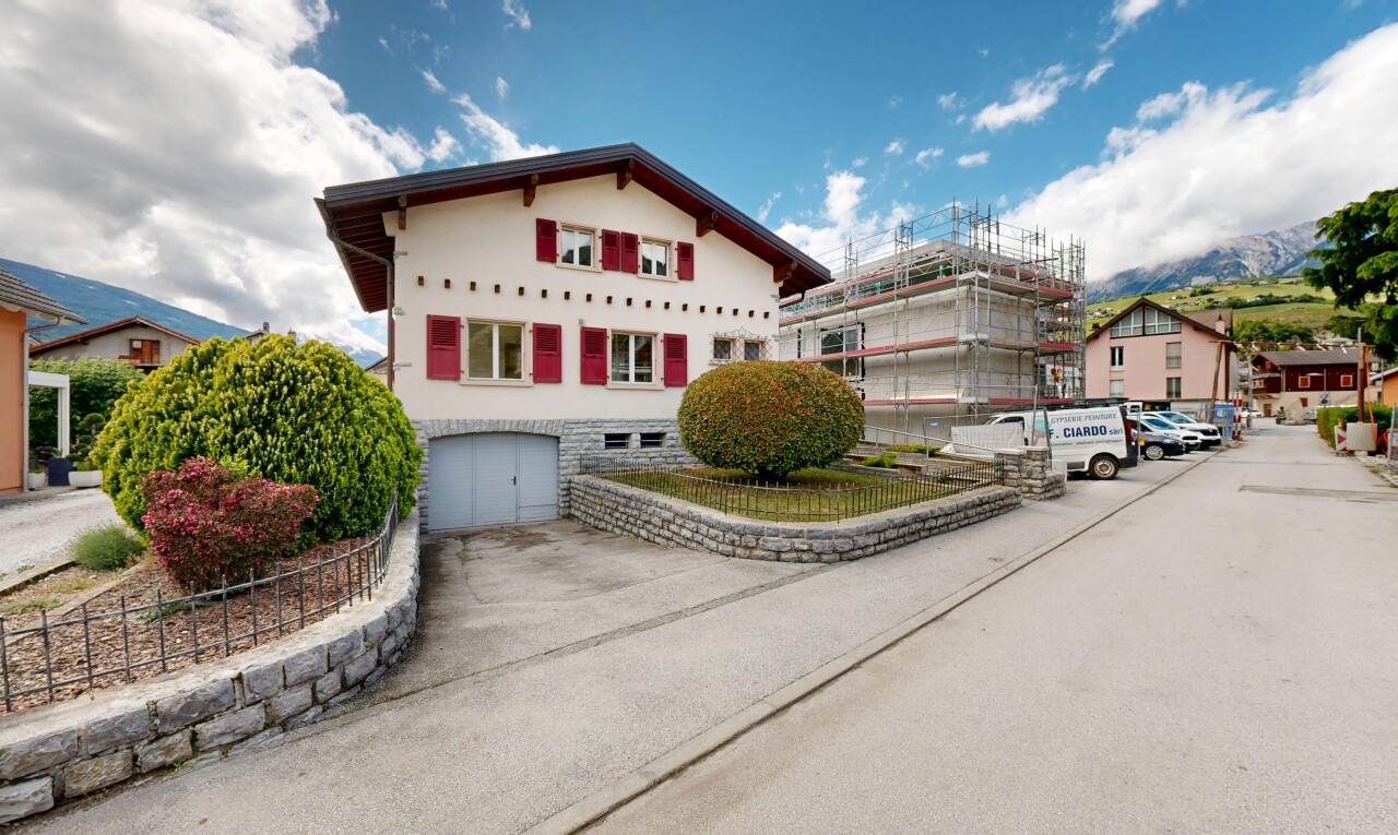 view of home featuring an attached garage