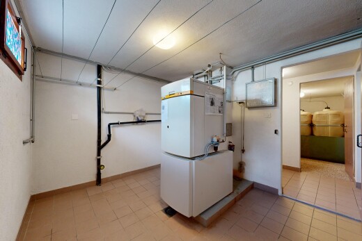 buanderie avec inside property, light floor, cloison sèche, drywall, et plinthes murales