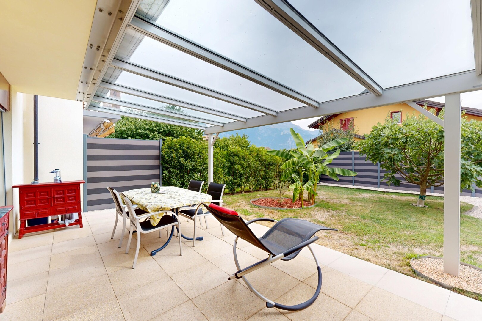 terrasse avec coin repas extérieur, terrasse, et from property