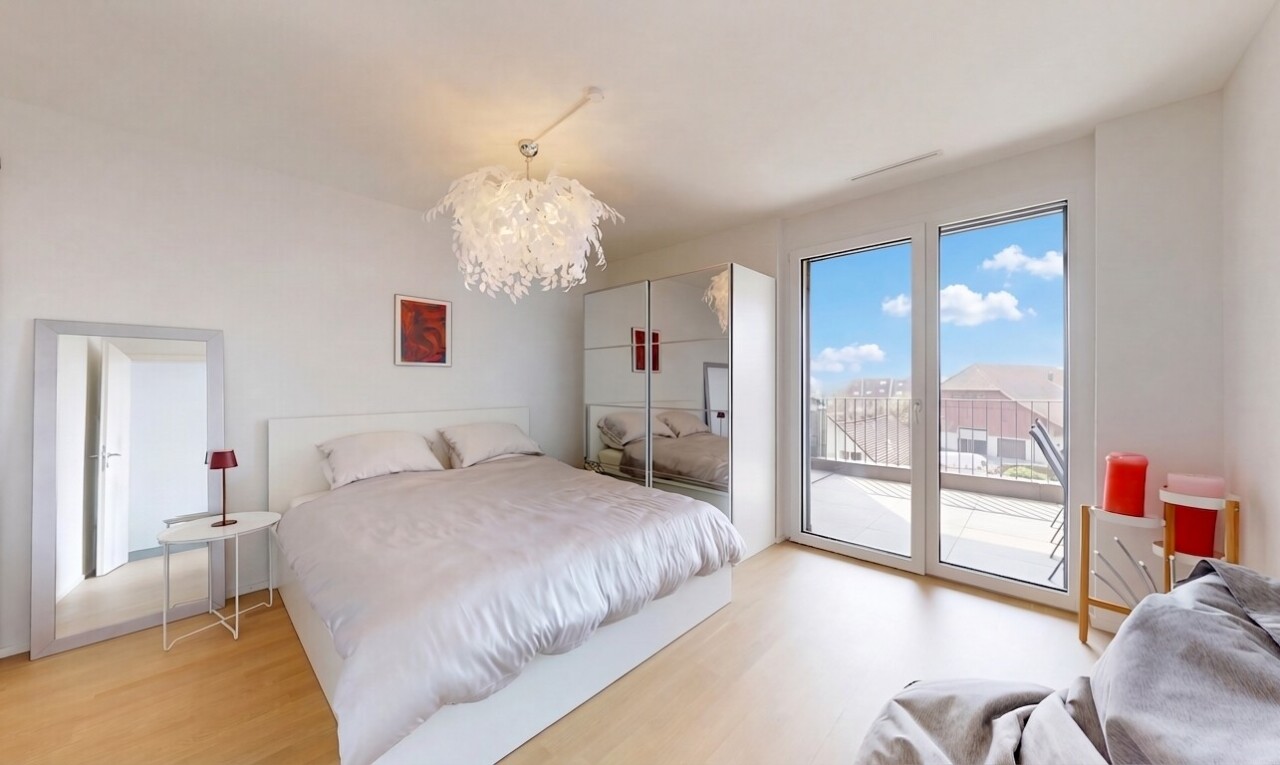 room featuring access to outside and light wood-style flooring