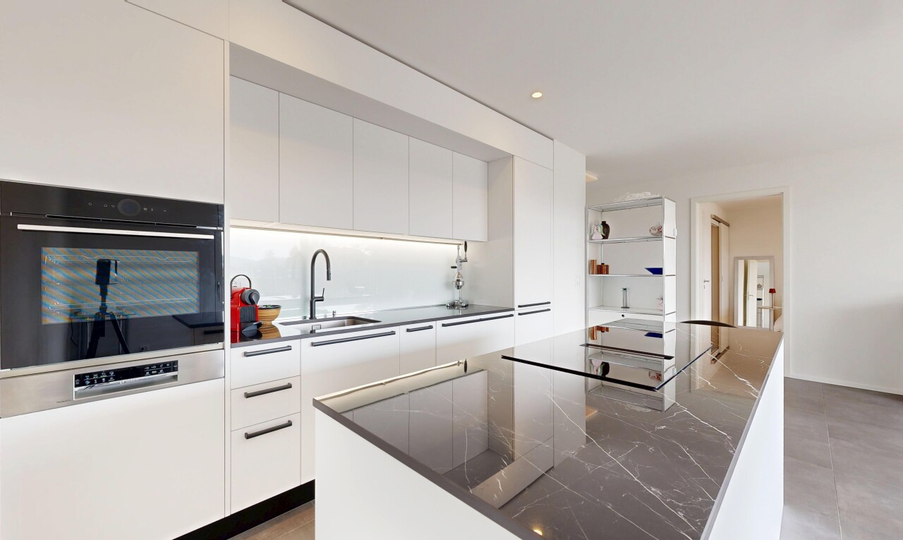 kitchen with modern cabinets, wall oven, a kitchen island, recessed lighting, and white cabinets