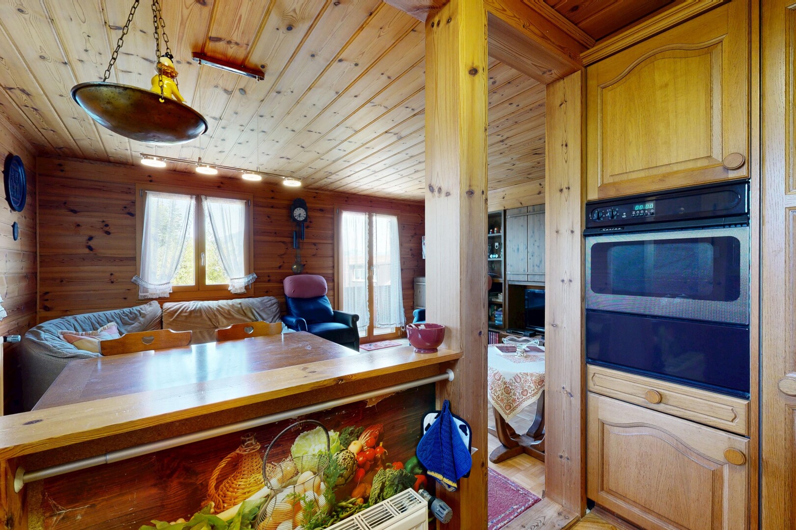 küche mit arched cabinets, bogenförmige schränke, raised cabinets, hochgezogene schränke, und dated wood wall