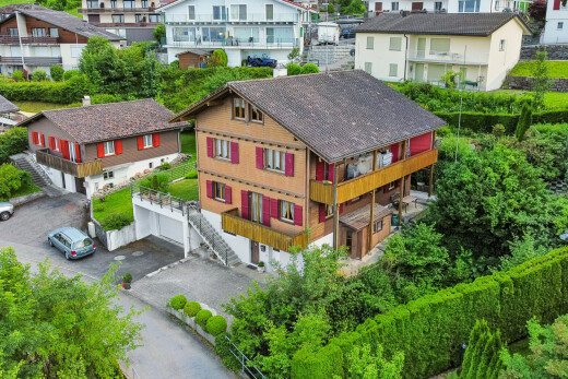 outdoor house with a balcony