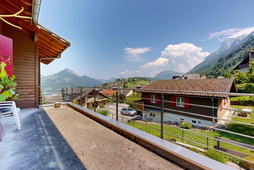 balcony featuring a mountain view