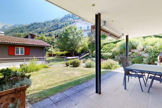 patio / terrace featuring a patio, outdoor dining area, and a mountain view