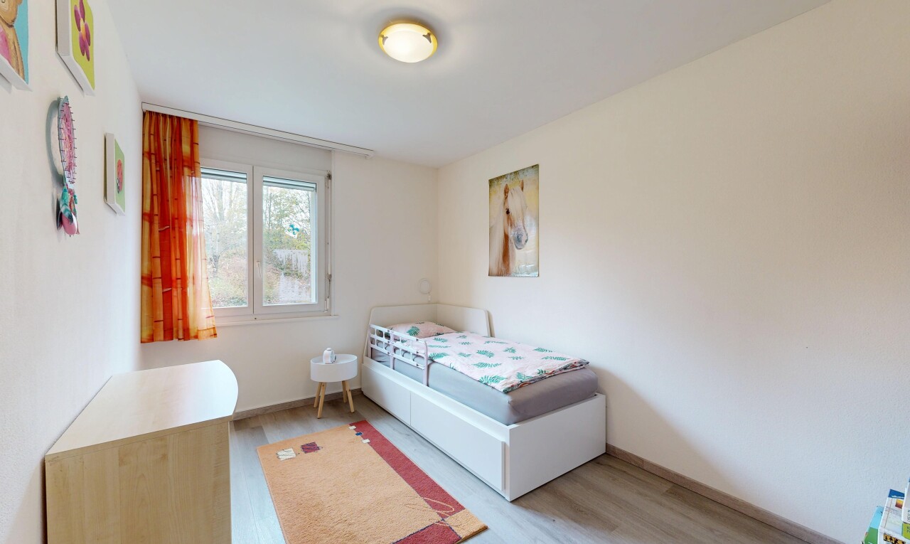 room featuring light wood finished floors and baseboards