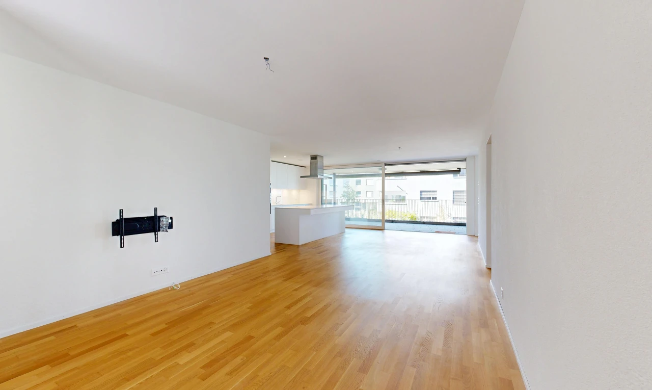 pièce vide avec drywall, cloison sèche, inside property, wood finish floor, et sol en finition bois