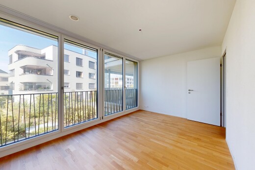 empty room featuring light wood-style floors and floor to ceiling windows