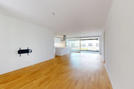 pièce vide avec drywall, cloison sèche, inside property, wood finish floor, et sol en finition bois