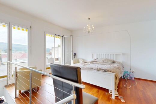 room featuring access to outside and wood finished floors