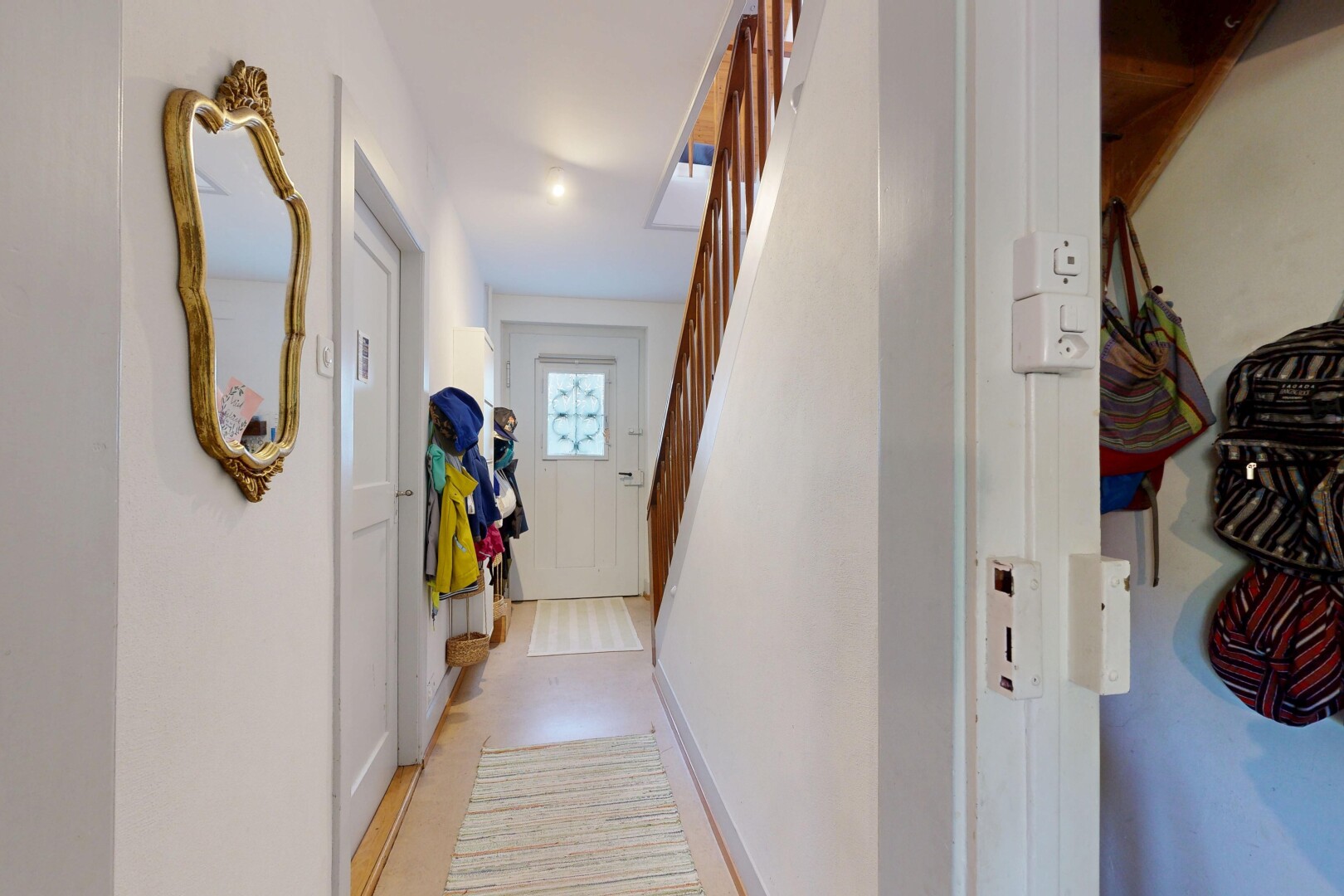 corridor featuring stairs