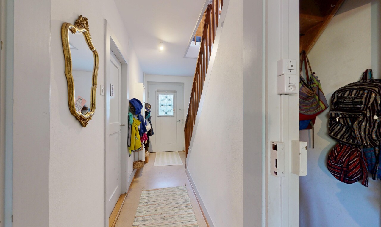 corridor featuring stairs