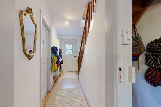 corridor featuring stairs