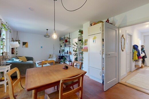 dining space with wood finished floors
