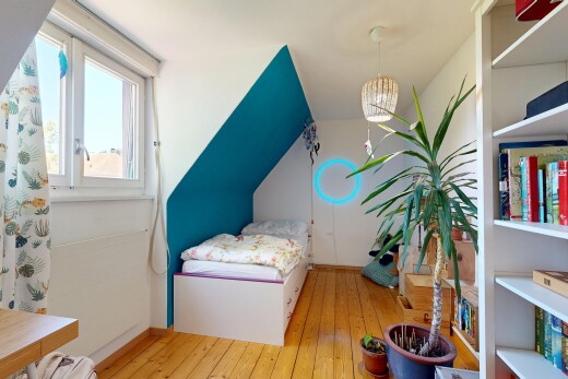 room with light wood-style floors, vaulted ceiling, and built in features