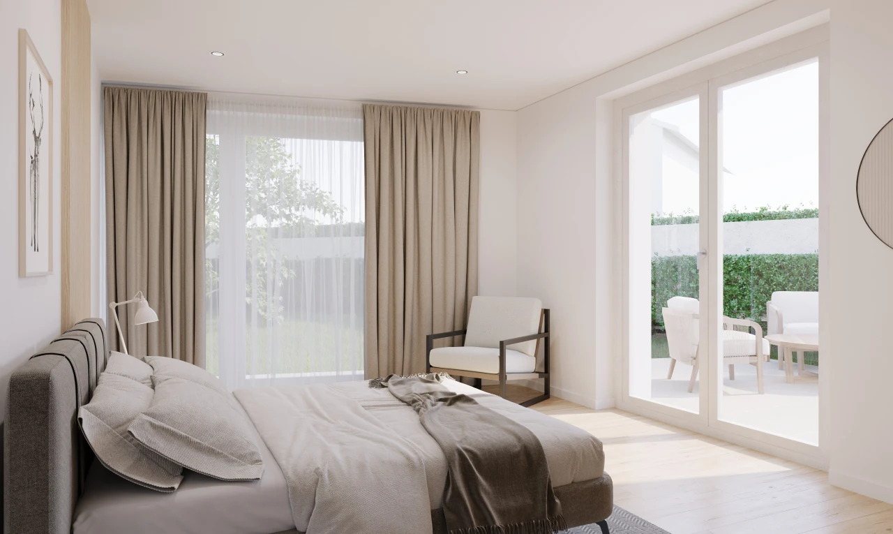 chambre avec accès à l'extérieur, lumière naturelle, et plancher de bois