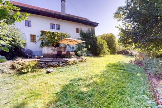 garden with a patio area and a lawn