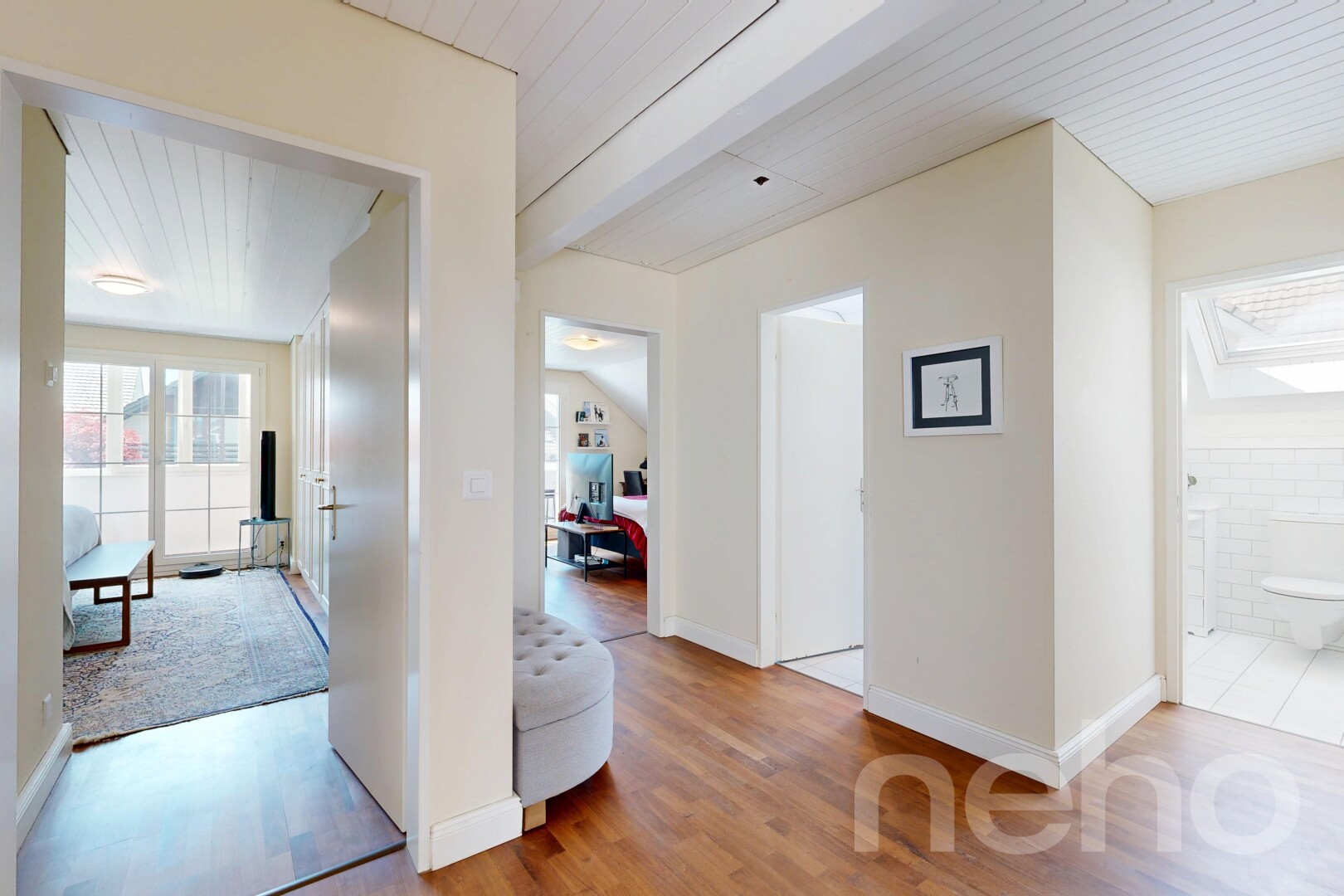 hall with wood finished floors and wooden ceiling