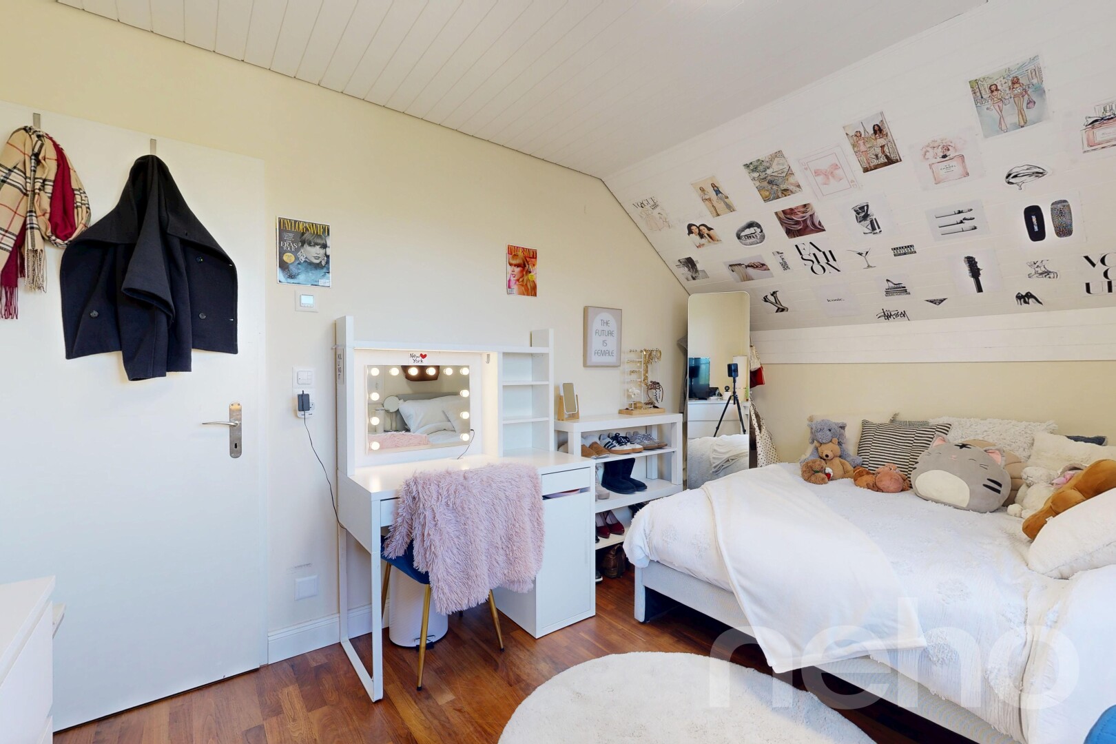room / bedroom with wood finished floors and vaulted ceiling
