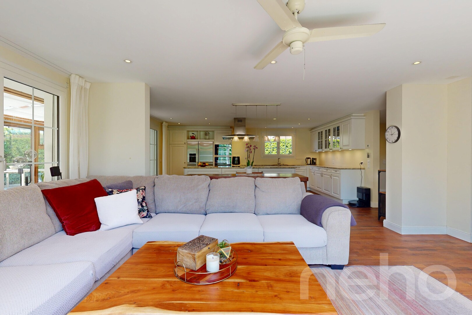 living room featuring wood finished floors, ceiling fan, and recessed lighting