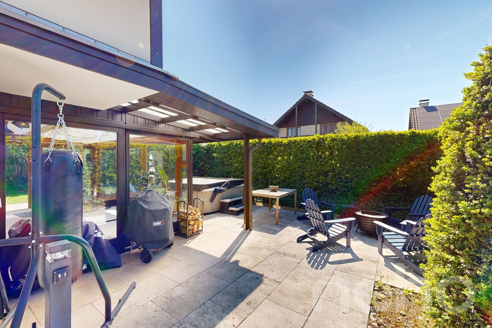 patio / terrace with a patio and a fire pit