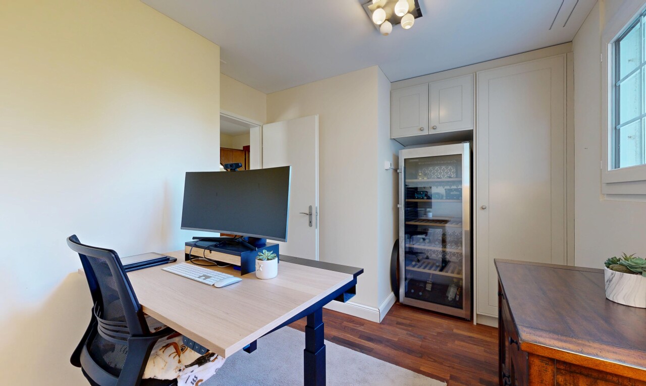 home office featuring wine cooler and dark wood-type flooring